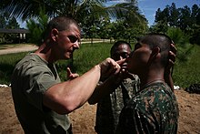 Muscular gouging techniques demonstration by a Marine Corps Martial Arts instructor USMC-100912-M-5332N-146.jpg
