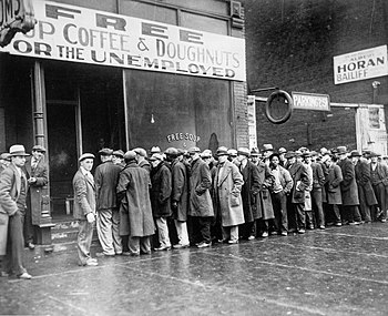 Unemployed men queued outside a depression sou...