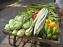 Vegetables (and some fruit) for sale on a street in Guntur, India Vegetable Cart in Guntur.jpg