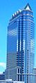 The façade of 100 North Tampa is composed of pewter-tinted glass and Spanish granite.