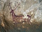 Картина оленей в пещере