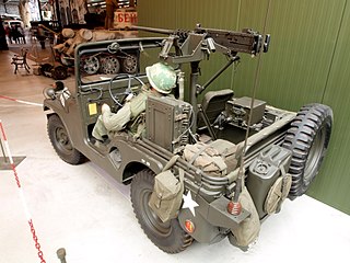 M38A1C spotter unit with .50 cal machine gun.