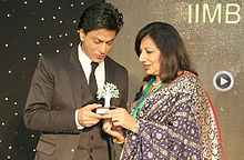 Dr Kiran Mazumdar-Shaw, Chairperson, Board of Governors, IIMB, with Shah Rukh Khan during IIMBUE 2015 on Dec 11 Kiran-Shahrukh.jpg