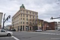 West side of Main Street in the North End. The former Hotel Arrigoni; Scranton Building;Arthur Magill, Jr. House - Chase School; and a 1920 commercial building at 635 Main Street.