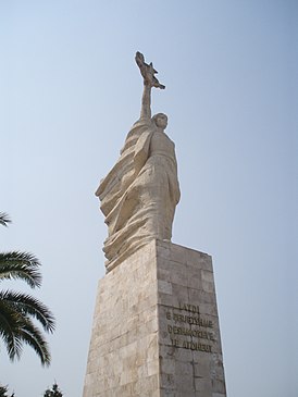 Памятник «Мать Албания»[1] 1972 (совместно с Кристаком Рамой (англ.); 1932—1998 и Мунтазом Драми (алб.), род. 1936). Кладбище Мучеников, Тирана