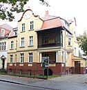 Wohnhaus mit Einfriedung