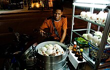 A street vendor in Chiang Mai, Thailand, selling various types of salapao Salat pao street vendor chiang mai 03.jpg