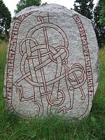 Ärentuna runestone with interlaced animal, Uppland, Sweden