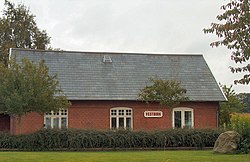 Brick building with a sign which reads 'Vestbirk'