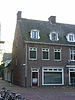 Winkel-woonhuis met werkplaats