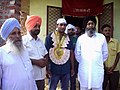 Sarpanch Ram singh welcome kabaddi player gurmukh singh in 2011