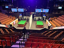 image of the Theatre from inside, with seating and two snooker tables