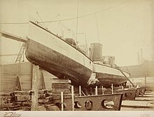 Turbinia after being hit by the Crosby. A photograph of the damaged Turbinia, taken by W. Parry in 1907. In January that year 'Turbinia' was moored at Wallsend when she was hit by the 'Crosby', a ship launched from Robert Stephenson's (5425199870).jpg