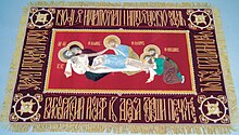 The epitaphios ("winding sheet"), depicting the preparation of the body of Jesus for burial Gold embroidery example.jpg