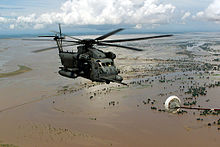 A US helicopter flying over the flooded Limpopo River during the 2000 Mozambique flood Helicopter over flooded Central Mozambique.jpg