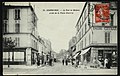 La rue de Bezons prise de la place Charras, dans les années 1900.