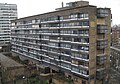 A view with showing the distinctive 'half floor' arrangement between the internal walkways (shown by the end windows) and the accommodation floors (shown by the side windows)