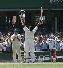 Sachin Tendulkar celebrating his 38th Test century during a match against Australia in 2008. He holds multiple world records including the world's leading run-scorer and century maker in both Tests and ODIs. Tendulkar closup.jpg