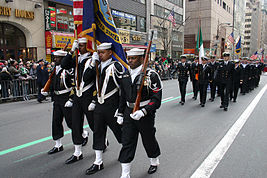 Members of Naval Reserve Center Bronx's color guard march up Fifth Avenue at the 244th Annual NYC St. Patrick's Day parade US Navy 050317-N-5637H-001 Members of Naval Reserve Center Bronx's color guard march up Fifth Avenue in New York City (NYC), at the 244th Annual NYC St. Patrick's Day parade.jpg
