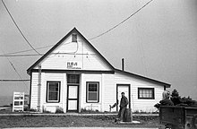 Alascom (then owned by RCA) building in Unalaska in August 1972. As with much of rural Alaska in the 1970s, this building contained the community's only telephone at the time. Unaalska 2.13.jpg