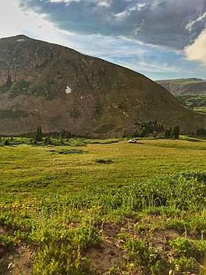 Illegal off-roading of a vehicle on Rollins Pass near Mount Epworth and Deadman's Lake. The alpine tundra is extremely fragile and can take 100–500 years to fully recover.[229][230]