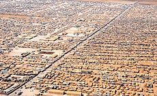 Aerial view of Zaatari refugee camp for Syrian refugees in Jordan, July 2013 An Aerial View of the Za'atri Refugee Camp.jpg