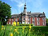 Ensemble van het kasteel van Boëlhe, het bosrijke park en zijn omgeving