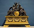 A French Empire mantel clock representing Mars and Venus, an allegory of the wedding of Napoleon I and the Archduchess Marie Louise, c.1810.