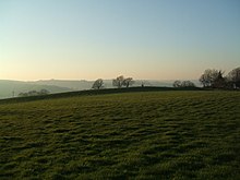 Cranmore Castle in Devon is an Iron Age earthwork. Like many scheduled monuments, it blends into the landscape, and may not be evident even to those crossing over it. CranmoreCastle1.jpg