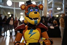 Five Nights at Freddy's Glamrock Freddy cosplayer at Comicon in November 2023 Five Night at Freddys Cosplayer VA Comicon November 2023.jpg