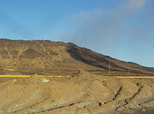 Landscape near Karabash, Chelyabinsk Oblast, an area that was previously covered with forests until acid rainfall from a nearby copper smelter killed all vegetation Karabash mountain.jpg