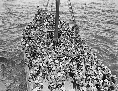 Photo by Ernest Brooks[a] – viewing from the deck of the Transport SS Nile – of the Lancashire Fusiliers aboard the Trawler 318 used in the Dardanelles landings, before disembarking at 'W' and 'V' beaches off Cape Helles on May 5, 1915 → June 12, 1915, 2 (43): 383