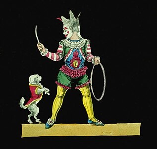 Lantern Slide of a dog jumping through a hoop (artist unknown)