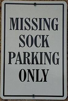 parking sign with the text "MISSING SOCK PARKING ONLY"