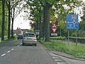 De voormalige N260 (Alphenseweg) op Belgisch grondgebied (formeel de N119) met Belgische bewegwijzering in Baarle-Hertog