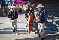 A pre-1970s-style norteño ensemble in Baja California, Mexico, consisting of an accordion, a tololoche and a snare drum ("tarola").