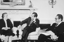 US President Richard Nixon and Israeli Prime Minister Golda Meir meeting on 1 March 1973 in the Oval Office. Nixon's National Security Advisor Henry Kissinger is to the right of Nixon. President Nixon, Henry Kissinger and Israeli Prime Minister Golda Meir, meeting in the Oval Office 1973.gif