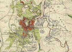 Safed street map (date 2018, white text and light grey streets) overlaid on a Survey of Palestine map (date 1942, black text, red urban areas and black streets), showing the relative locations of Safed to its three Mandate-era satellite villages: Al-Zahiriyya al-Tahta, Ein al-Zeitun and Biriyya.