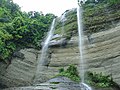 Image 39Shuvolong is a place in Barkol sub district, located about 25 kilometres (11 kilometres as the crow flies) away from Rangamati town. There are a few waterfalls in Shuvolong area with the largest one falling from as high as 300 feet. Shuvolong is accessible by speed boat or motor boats from Rangamati. The photo features Shovolong water falls in October (before winter). Photo Credit: Mirza Salman Hossain Beg, Bangladesh