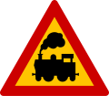 K-32 Level crossing without a barrier or gate (formerly used )