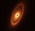 Image 3Astronomers used the James Webb Space Telescope to image the warm dust around a nearby young star, Fomalhaut, in order to study the first asteroid belt ever seen outside of the Solar System in infrared light. (from Cosmic dust)