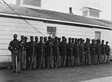 Soldiers of the Fourth United States Colored Infantry at Fort Lincoln, 1865 4th United States Colored Infantry.jpg