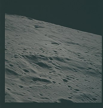 Easley is at the center of this oblique view from Apollo 15. The west rim of Curie crater is in the foreground.