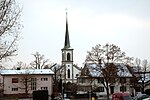 vorne rechts: Kirchgemeindehaus, hinten: Reformierte Kirche