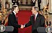 Tony Blair and George W. Bush shake hands afte...