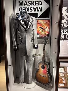 Bob Dylan costume guitar and poster from Masked and Anonymous, on display at the Bob Dylan Center in Tulsa, Oklahoma.