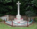 Village war memorial adjacent to churchyard gate