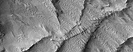 Close view of curved ridges, as seen by HiRISE under HiWish program. These formed underground and then were uncovered by erosion.
