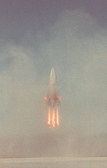 First landing. The yellow exhaust is due to the low throttle settings, which burns at lower temperatures and is generally "dirty" as a result. DC-XA first landing.jpg