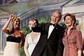 President George W. Bush points out members of the audience to First Lady Laura Bush during the "Black Tie and Boots Inaugural Ball" in Washington, D.C held on January 19, 2005.